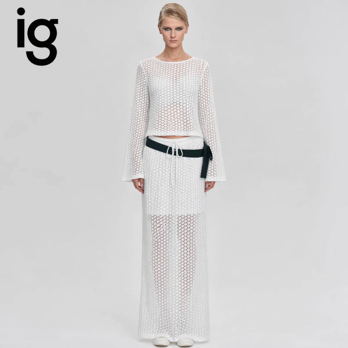 Formal Skirt - ชุดเซ็ตสองชิ้นถักแบบโปร่งสำหรับผู้หญิง IG 2026 เสื้อครอปแขนบานและกระโปรงยาวเอวผูกเชือกพร้อมเข็มขัดโบว์เข้าชุด